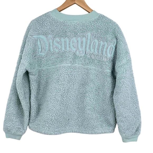 Disney Shimmery Aqua Disneyland Faux Sherpa Spirit Jersey Long Sleeve Sweater - Picture 3 of 9